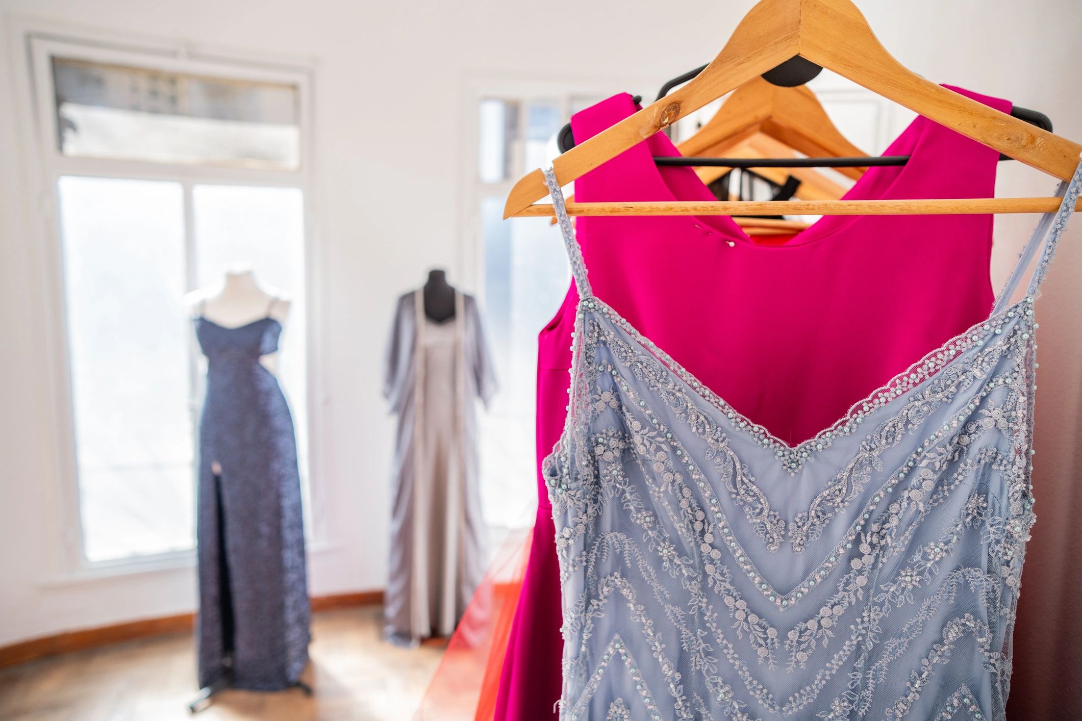 Curated fashion garments displayed on a rail